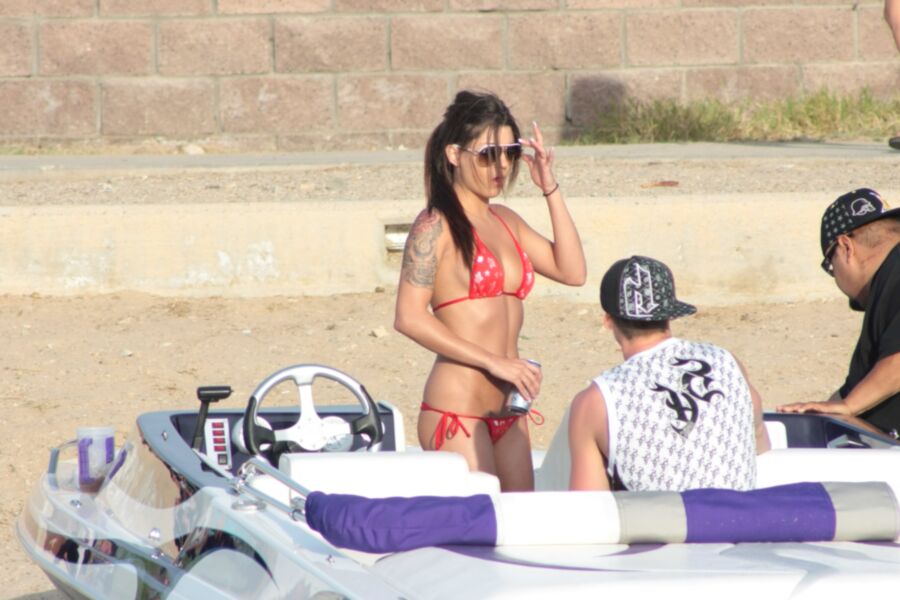 Brunette in Red Thong Bikini