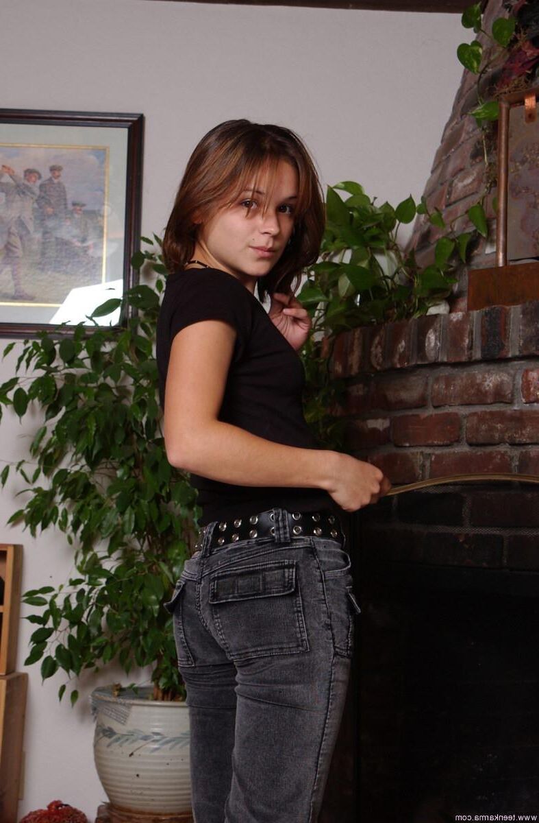 Teen Karma Black Top Gray Pants At Fireplace