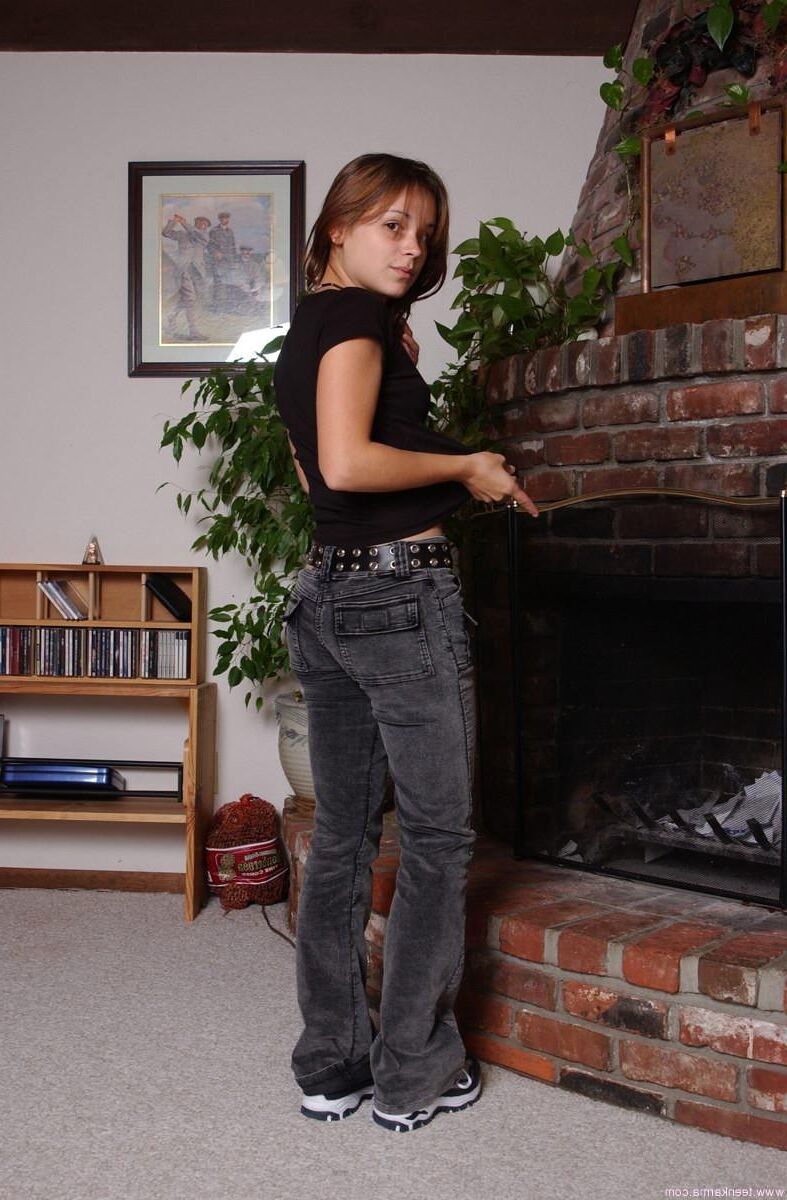 Teen Karma Black Top Gray Pants At Fireplace