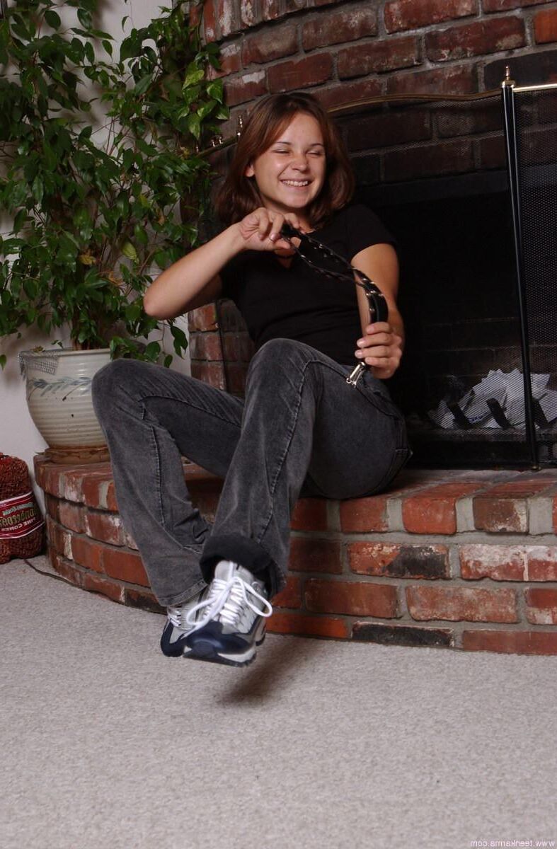 Teen Karma Black Top Gray Pants At Fireplace