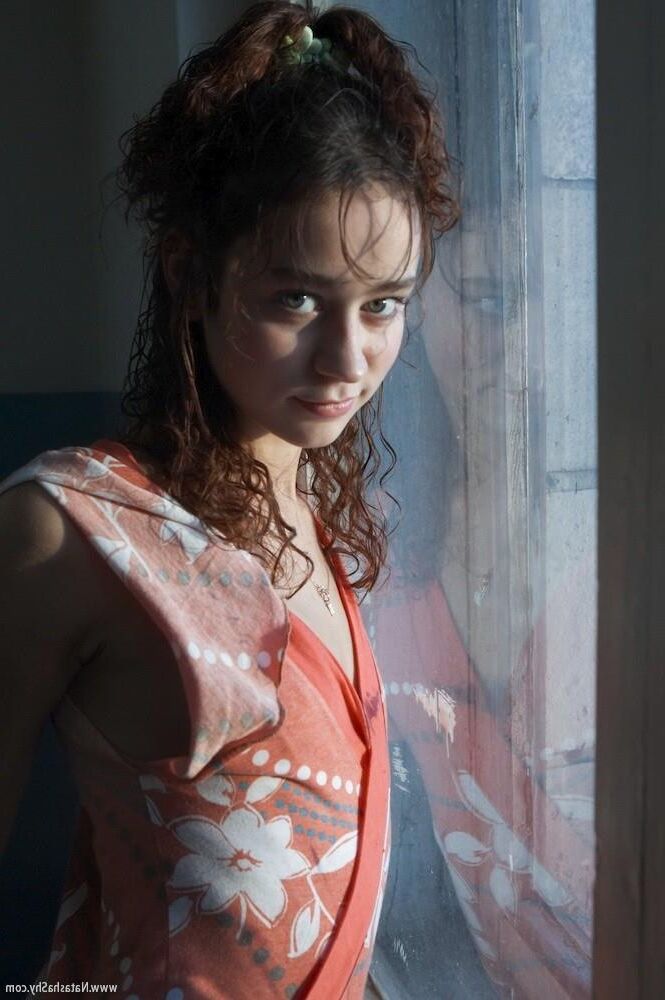 Natasha open clothes