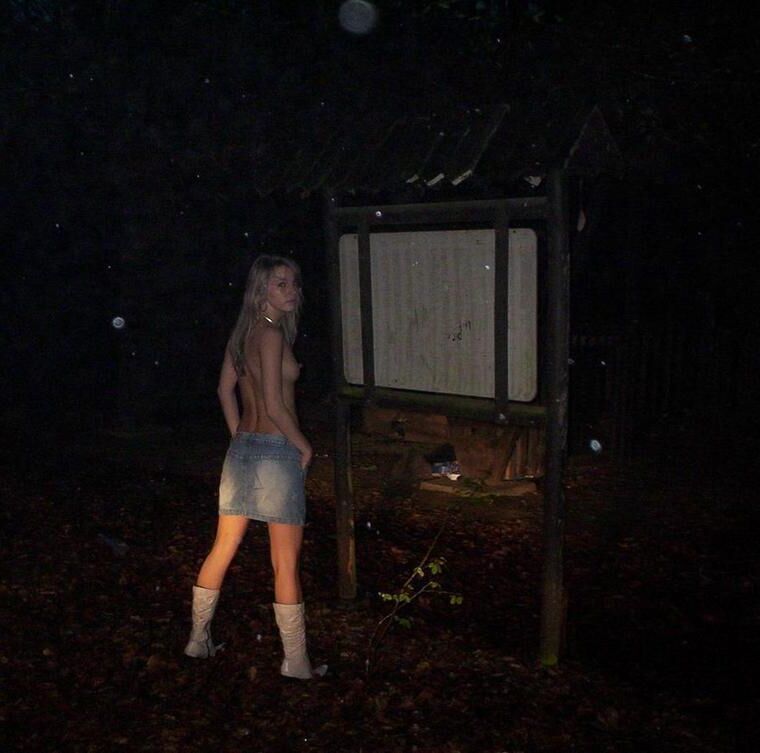 Teenage blonde poses in nature