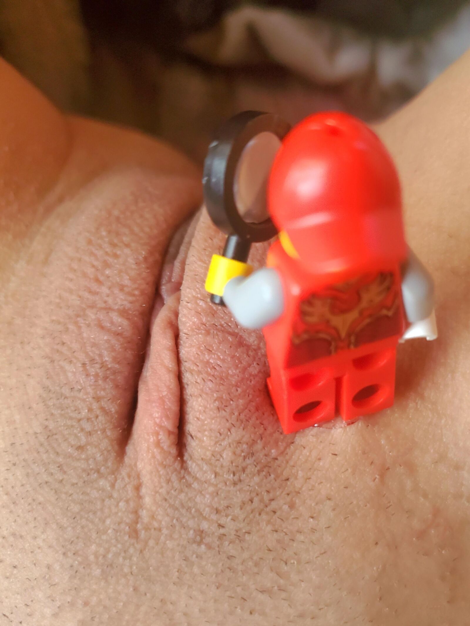 Teen plays with Lego