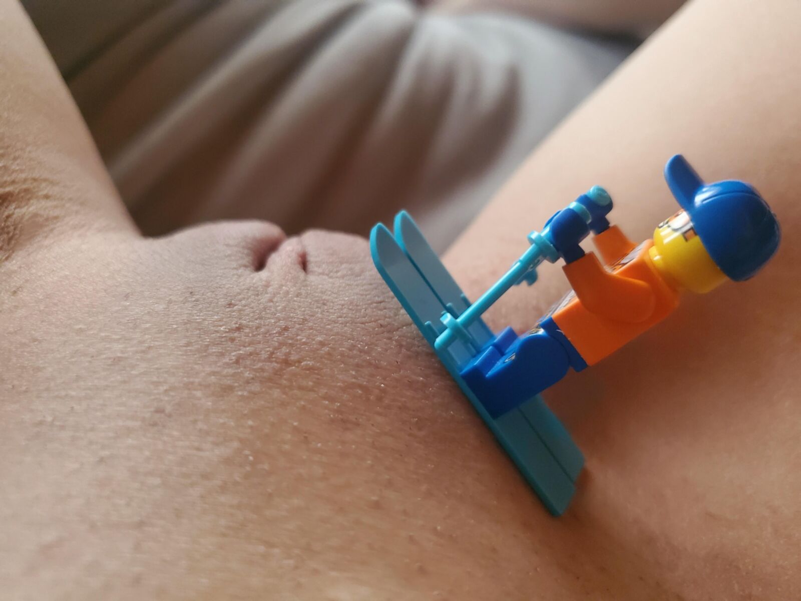 Teen plays with Lego