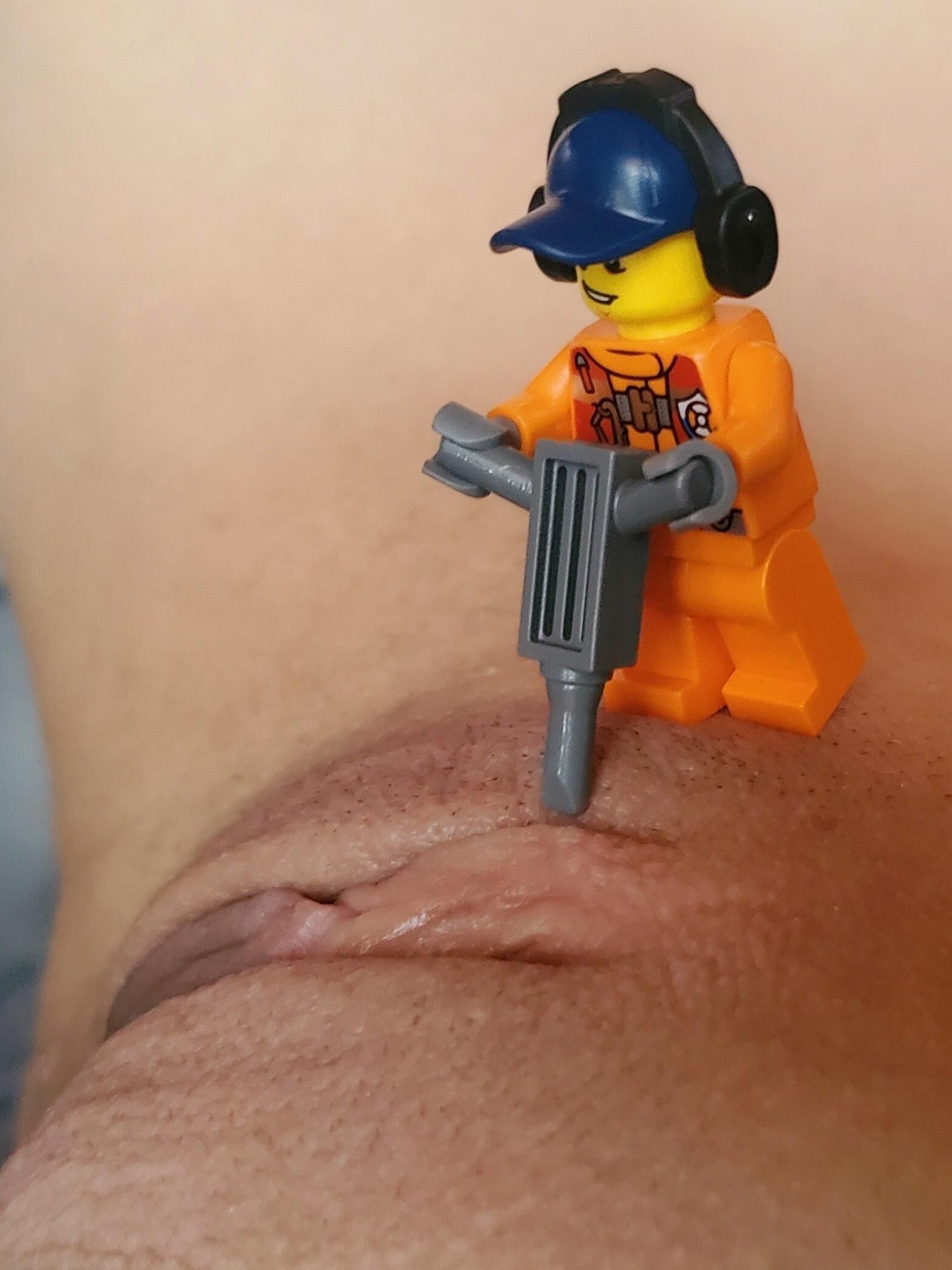 Teen plays with Lego