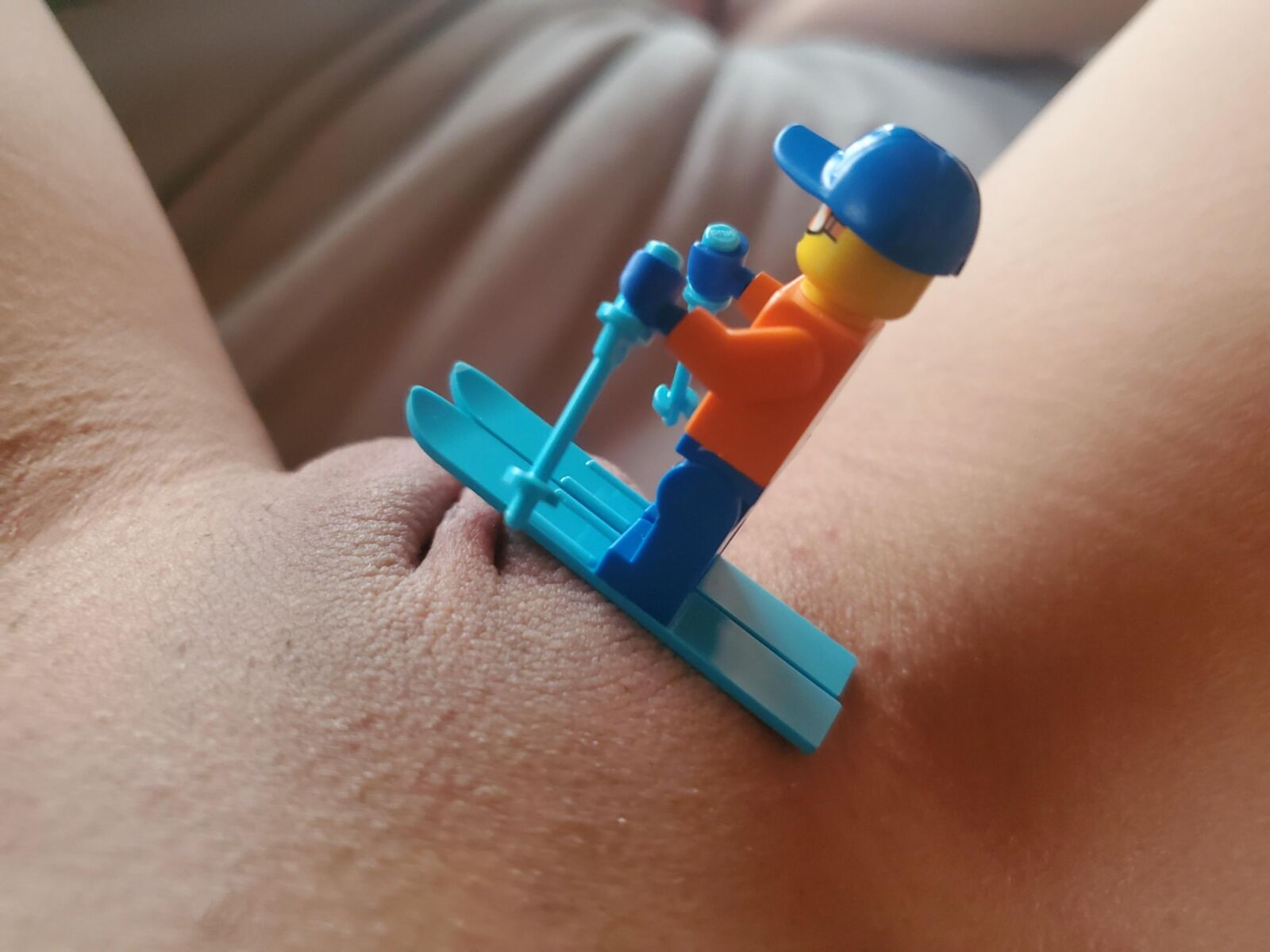 Teen plays with Lego