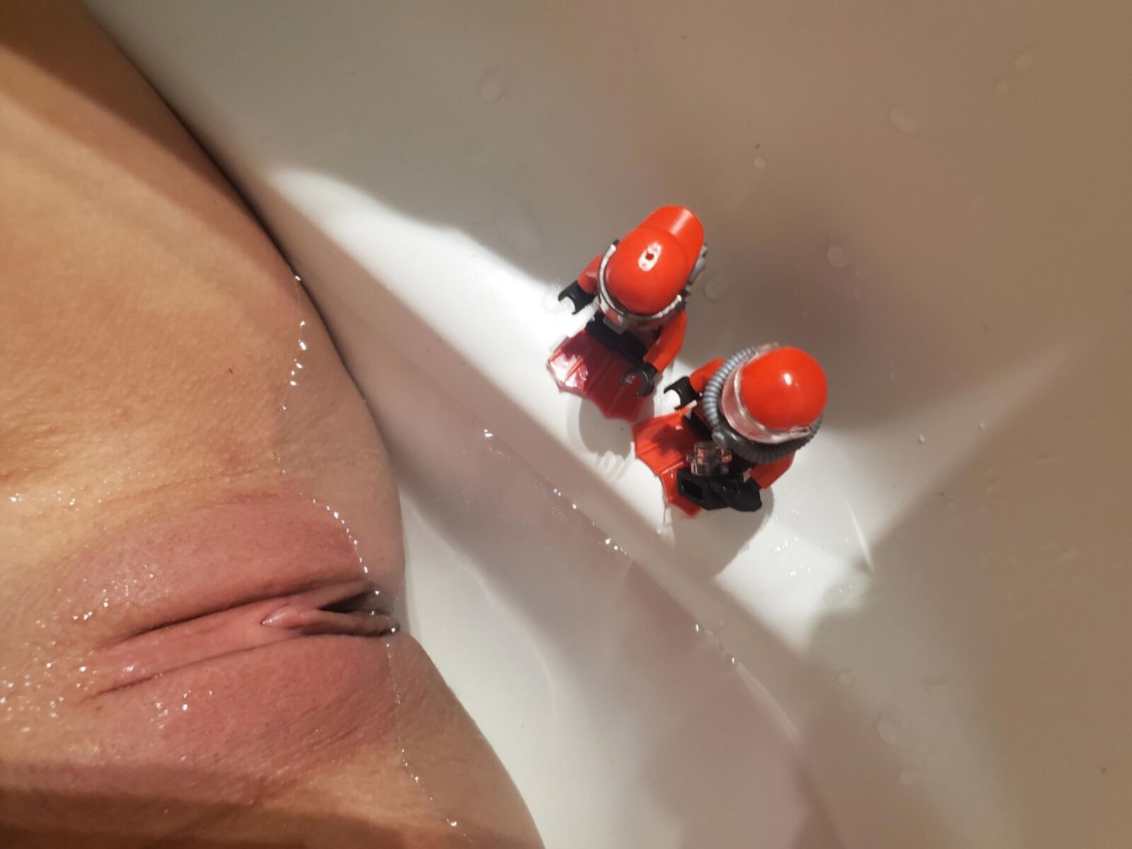 Teen plays with Lego