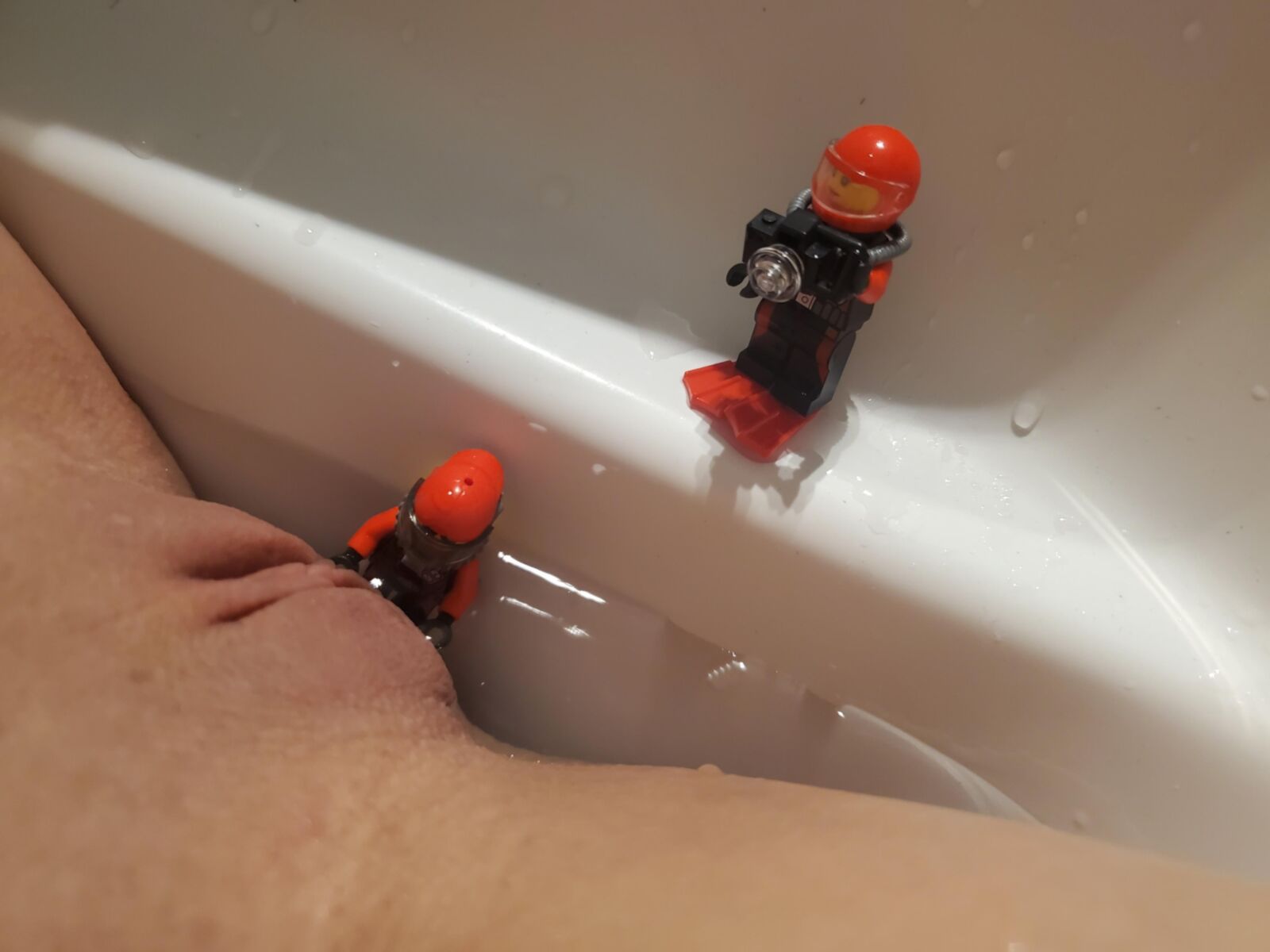 Teen plays with Lego