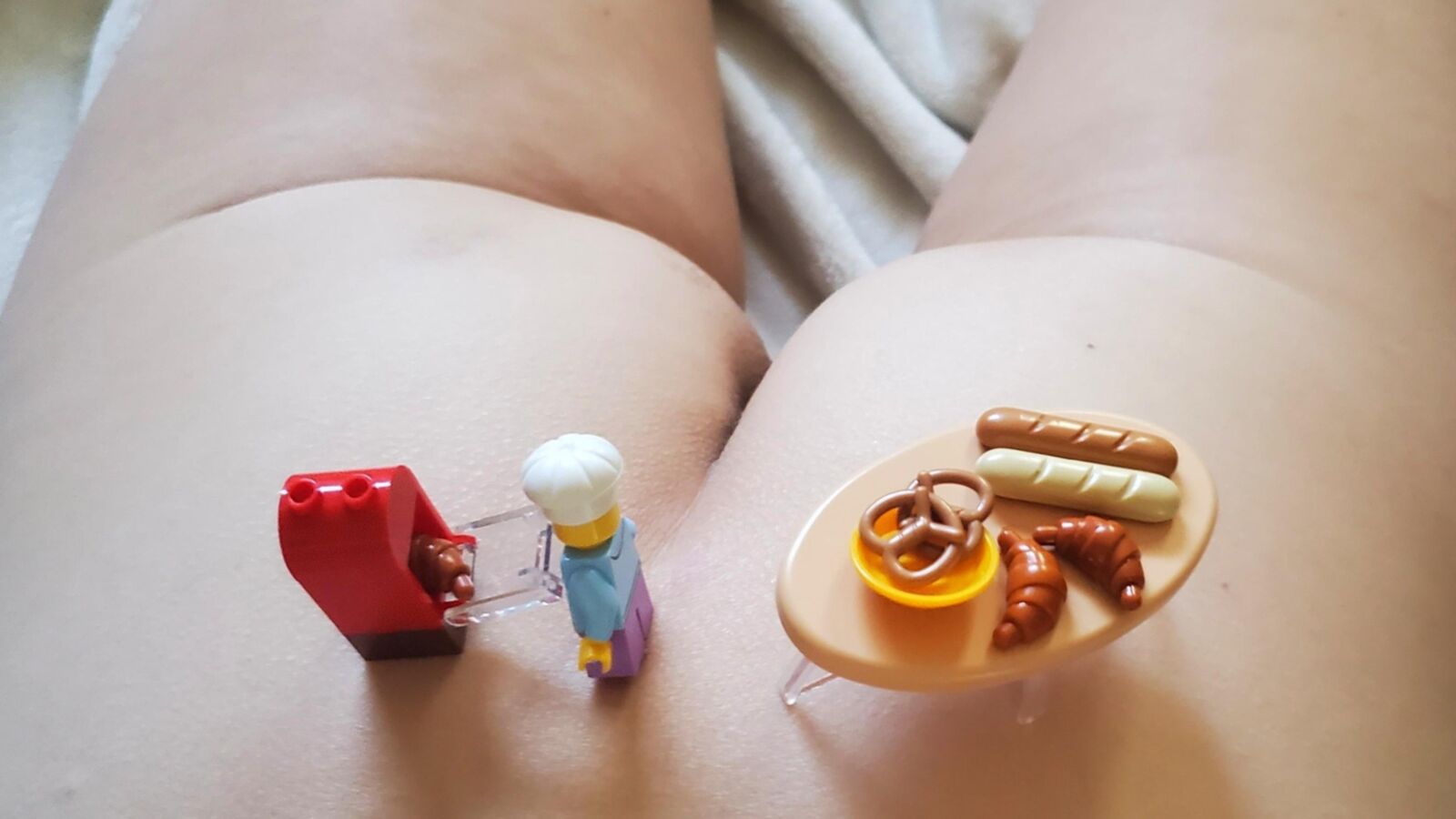 Teen plays with Lego