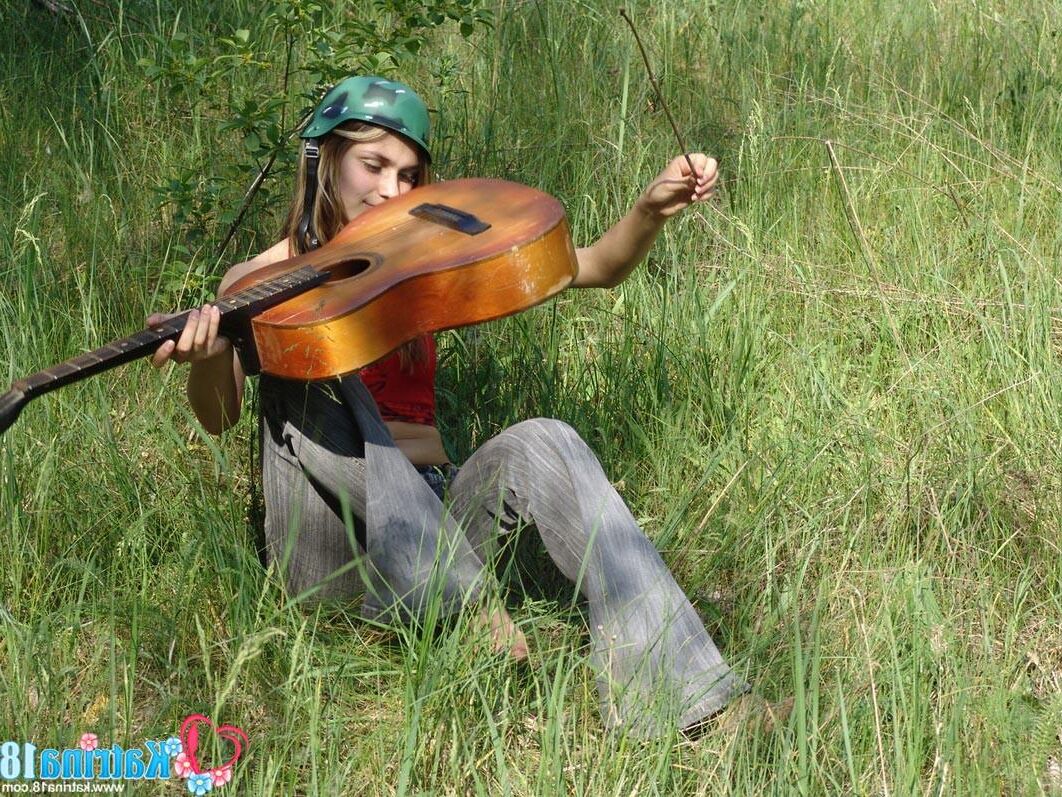 Katrina _ playing guitar