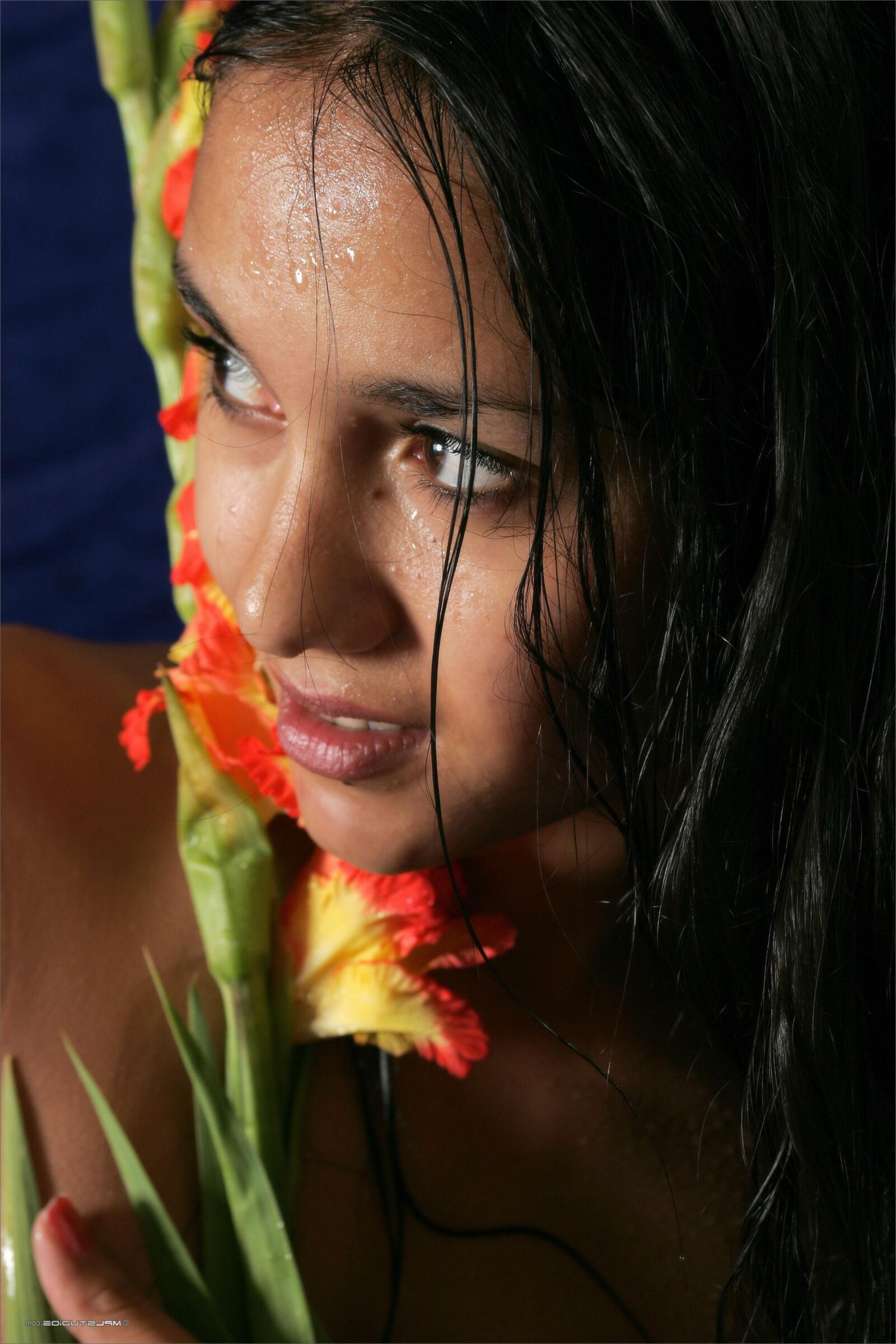 Kamilla with a flower fully nude teen on the bed