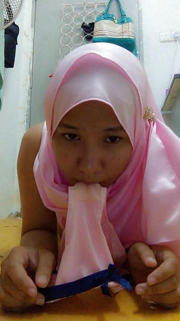 Indonesian Hijab teen being naughty