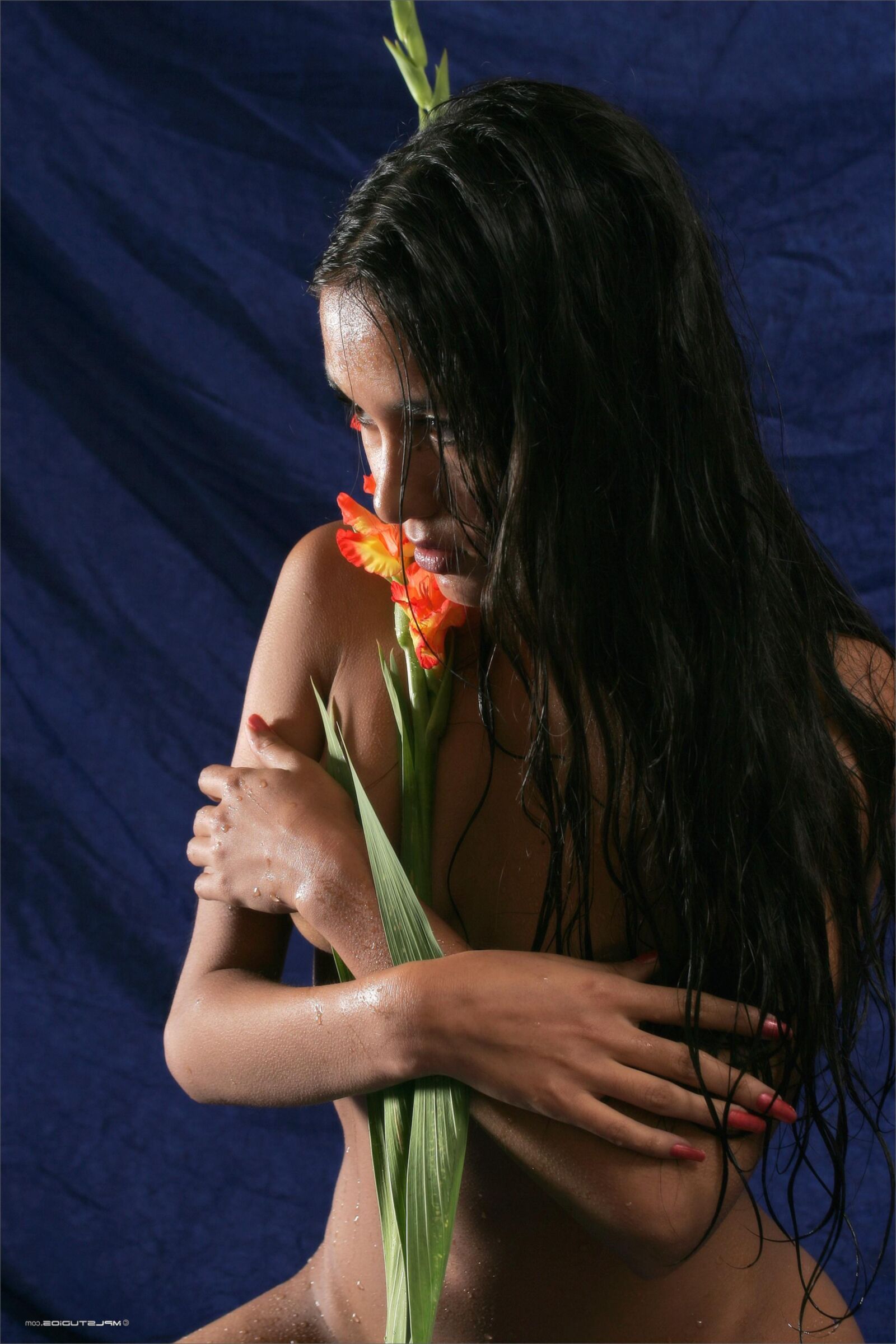 Kamilla with a flower fully nude teen on the bed