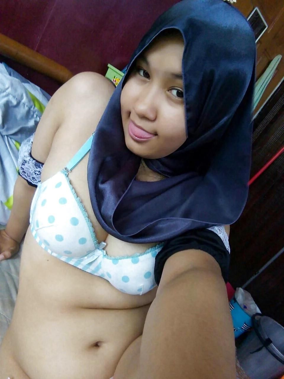 Indonesian Hijab teen being naughty