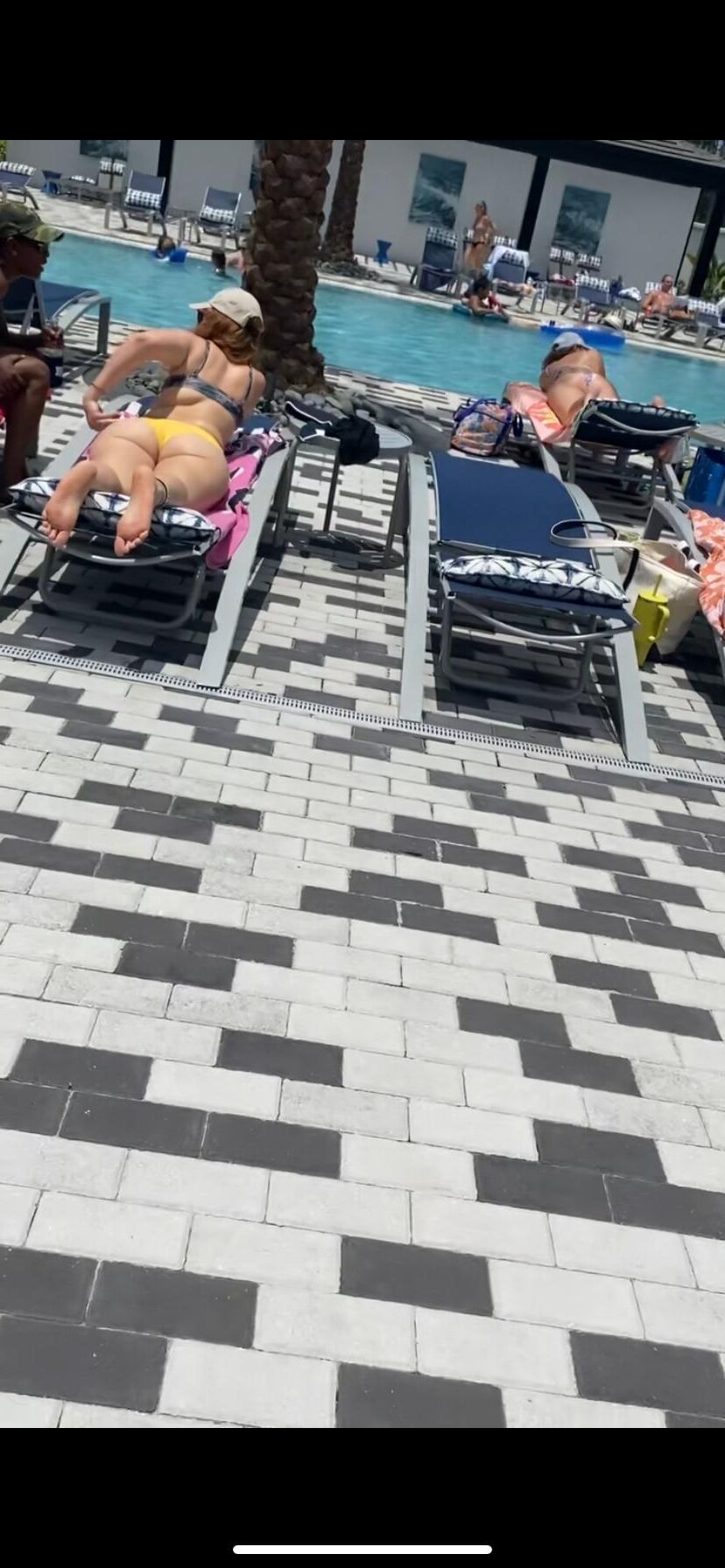 Feet and ass at the pool 