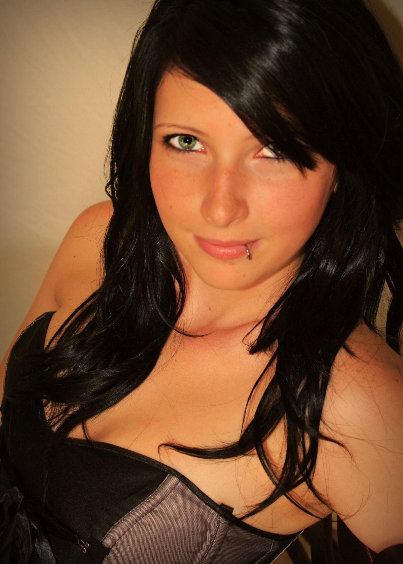 Dark haired teen posing at home