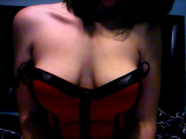 Dark haired teen posing at home