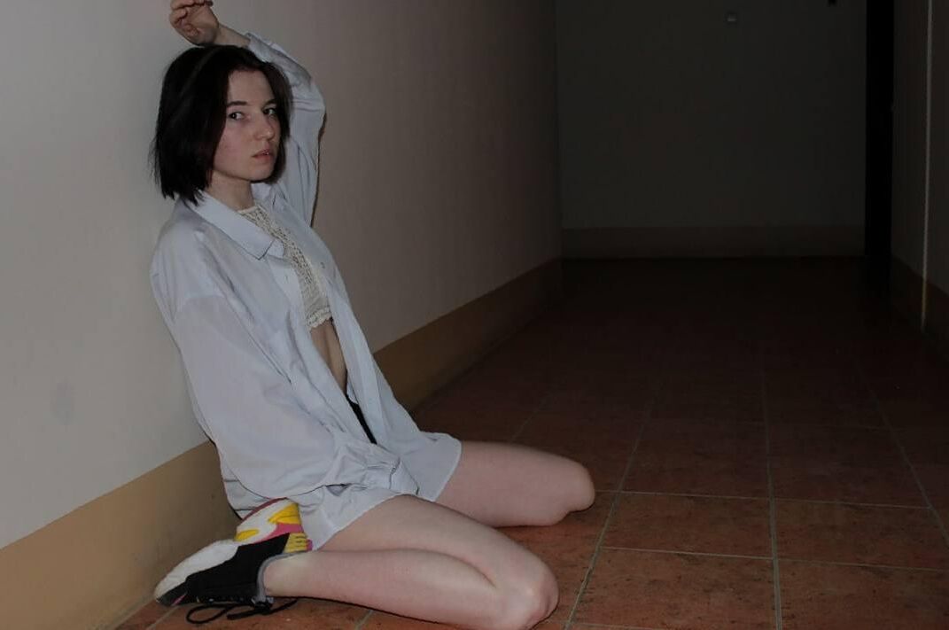 Teasing photoset in public stairway